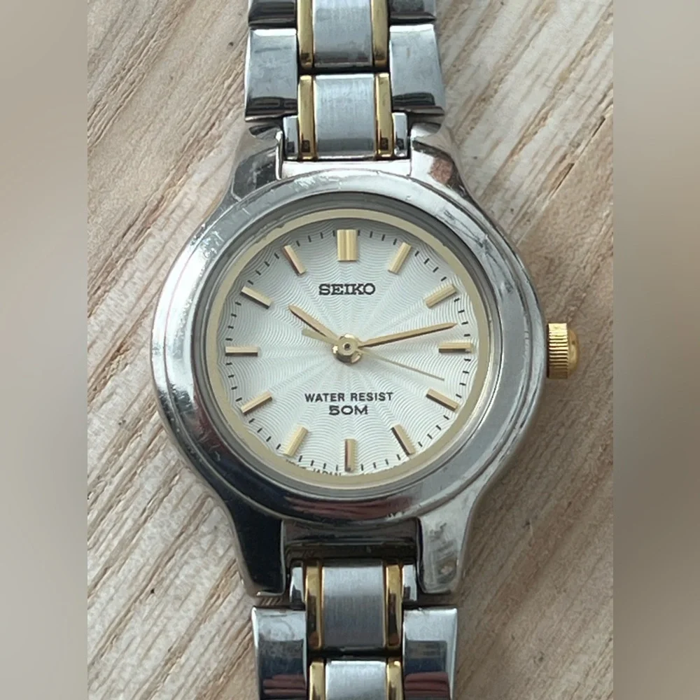 Seiko Ladies Watch Spiral Stainless Dial Gold-Tone Markers Two-Tone Bracelet